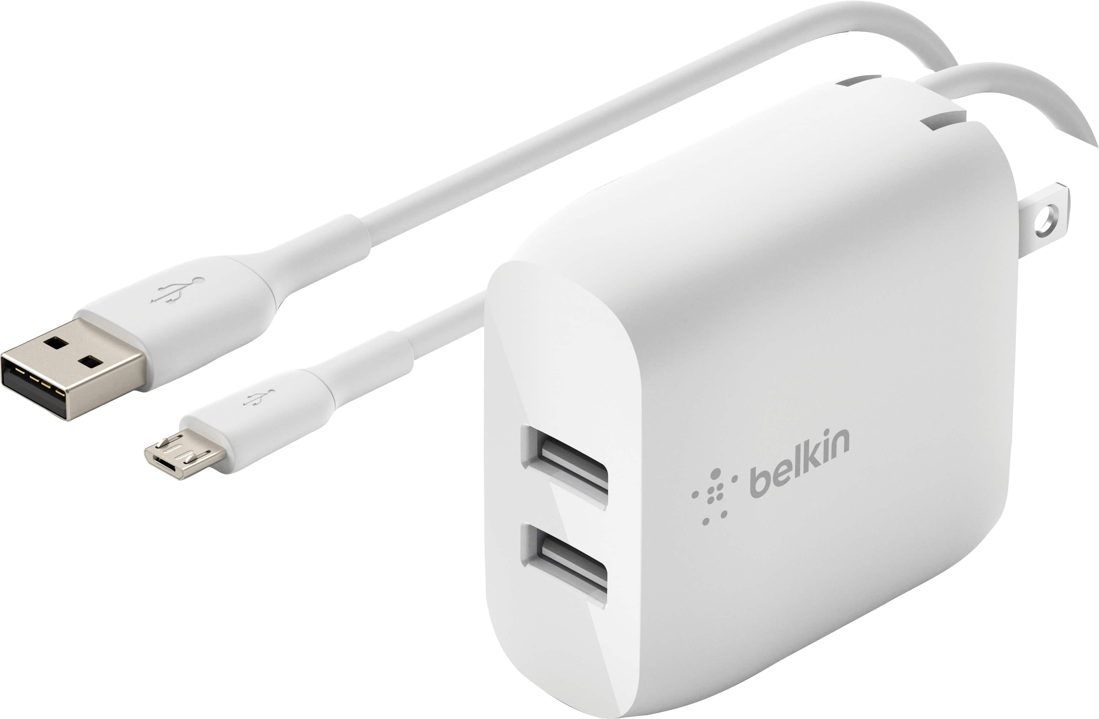 Belkin 24W Dual USB Wall Charger plugged into an outlet with devices charging
